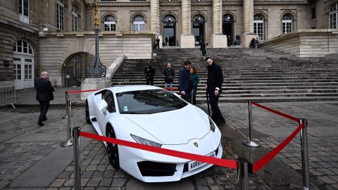 The Lamborghini displayed outside the Paris Court of Appeal, was just one of the confiscated luxury items to go on the selling block.