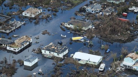 An aerial view of damage from Hurricane Dorian on September 5, 2019, in Marsh Harbour, Great Abaco Island in the Bahamas. - Hurricane Dorian lashed the Carolinas with driving rain and fierce winds as it neared the US east coast Thursday after devastating the Bahamas and killing at least 20 people.