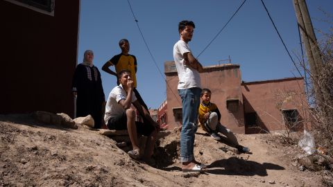 Family and neighbours of Lhssan Asoki looks the distroyed house where his wife and 3 kids died because of the earthquake in Moulay Brahim. Monday 11 september.