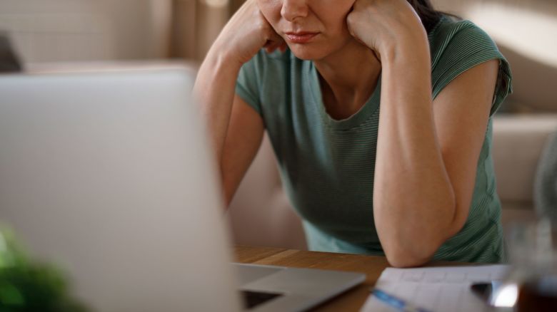 Woman struggling with new technology