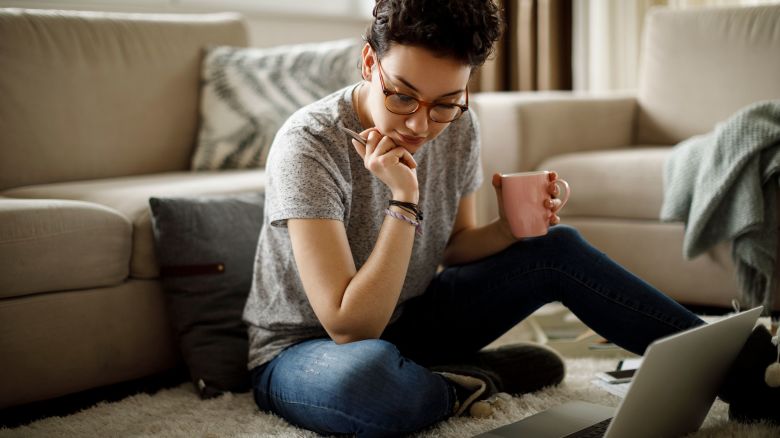 young woman laptop at home STOCK