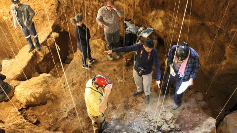 Archaeologists working at Tam Pa Ling cave in northeastern Laos.