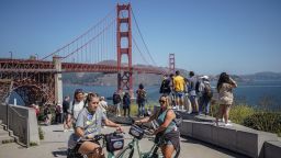 Mandatory Credit: Photo by Michael Ho Wai Lee/SOPA Images/Shutterstock (14069042a)
People ride bikes in front of the Golden Gate Bridge in San Francisco.
Daily life in San Francisco, USA - 7 Aug 2023