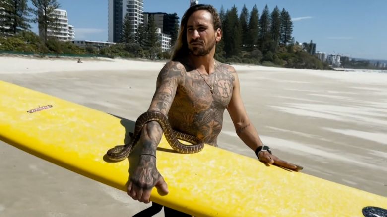 Higor Fiuza and his carpet python Shiva were frequently seen at beaches on the Gold Coast, a tourist hotspot on the country's east coast.