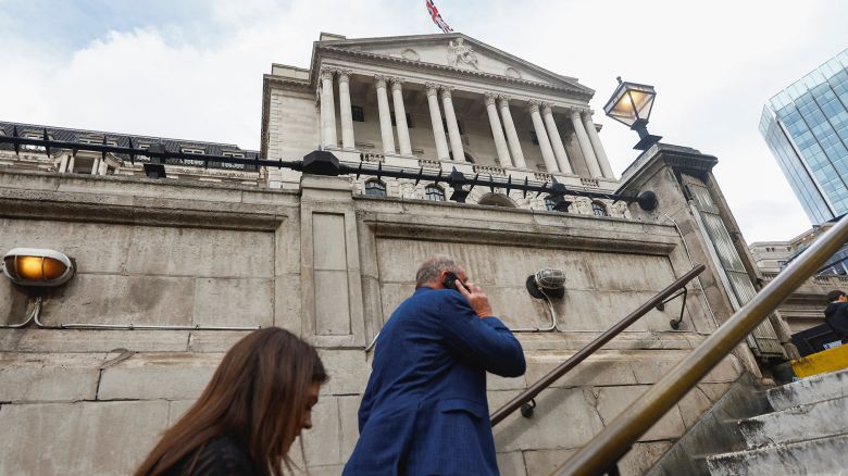 People walk outside the Bank of England in London, Britain, September 21, 2023. 