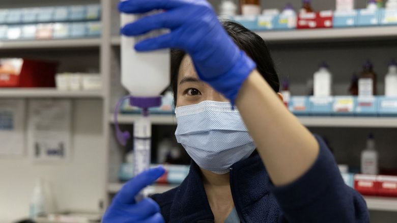 Inpatient pharmacist Selena Ko reconstitutes powered antibiotic amoxicillin and measures doses for pediatric patients on Nov. 10, 2022, at Rush University Medical Center in Chicago. (Erin Hooley/Chicago Tribune/Tribune News Service via Getty Images)