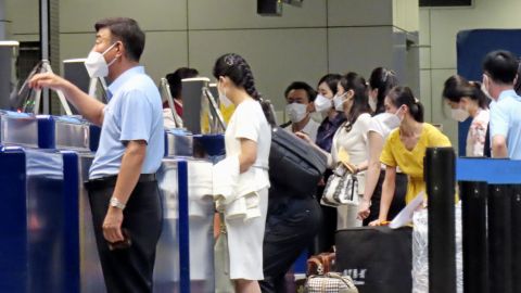 Passengers prepare to board an Air Koryo plane bound for Pyongyang at Beijing Capital International Airport in Beijing on Aug. 26, 2023, as North Korea recently resumed international passenger flights, marking the end of a suspension since early 2020 due to the COVID-19 pandemic.