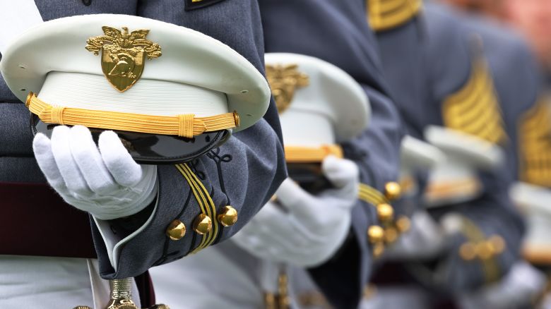 WEST POINT, NEW YORK - MAY 22: West Point graduates stand as the Army Song is played during the 2021 West Point Commencement Ceremony on May 22, 2021 in West Point, New York. U.S. Secretary of Defense Lloyd Austin returned to his alma mater to deliver the U.S. Military Academy's Class of 2021 commencement address. There are 995 cadets in this years graduation class.  (Photo by Michael M. Santiago/Getty Images)