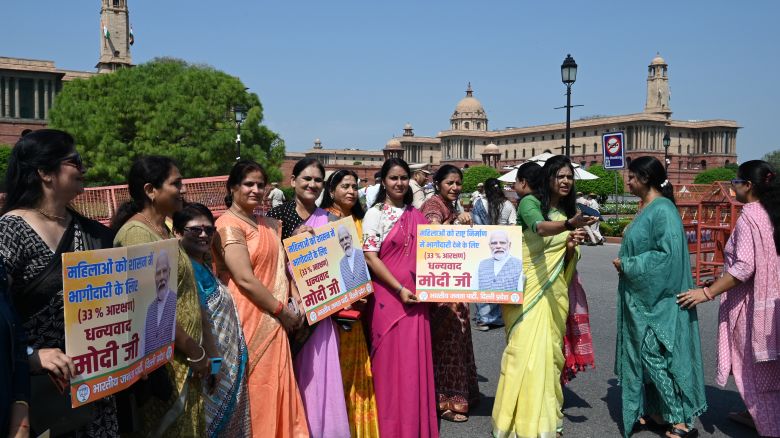 Members of the BJP women's offer sweets in celebration after the Women's Reservation Bill was passed in the Lok Sabha during the Special session of Parliament, in New Delhi, India on Thursday, September 21, 2023. 