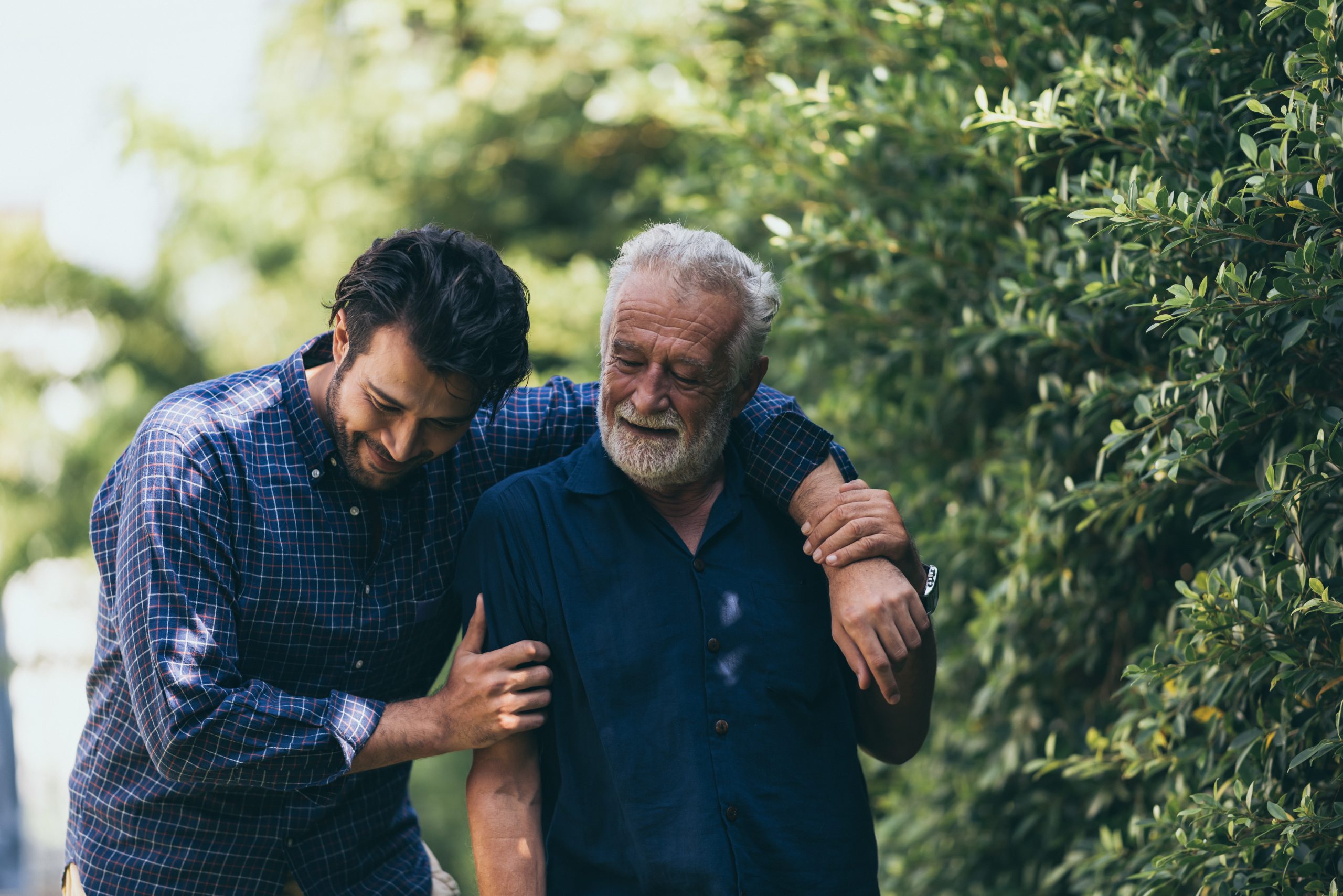 man and son walking together