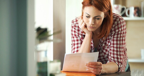 woman arranges home task prioritization for contractor