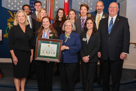 Secretary of the Army Christine E. Wormuth, left, presented the Zachary and Elizabeth Fisher Distinguished Civilian Humanitarian Award to members of the Children of Fallen Patriots Foundation, whose work providing financial aid to Gold Star children has impacted thousands. 