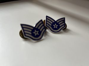 U.S. Air Force Staff Sergeant insignia.