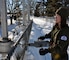 Tammy Johnson, Big Sandy Lake Recreation Area site supervisor, adjust the gates at the dam, near McGregor, Minn., Jan. 23. Despite temperatures dropping below negative 20 degrees, U.S. Army Corps of Engineers, St. Paul District park rangers continue working to ensure the reservoir levels are maintained as the district continues preparations for a spring runoff. 