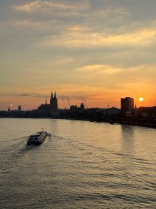 View over the Rhine at Cologne Cathedral during sunset
