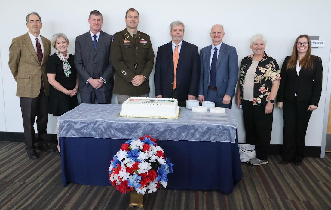 Speakers from the U.S. Army Corps of Engineers Mobile District, Joint Airborne Lidar Bathymetry Technical Center of Expertise, and other government partners pose for a group photo during the JALBTCX 25th Anniversary ceremony in Kiln, Mississippi, Nov. 29, 2023. The center executes operations, research, and development in airborne lidar bathymetry and complementary technologies to support the coastal mapping and charting requirements of USACE, the U.S. Naval Meteorology and Oceanography Command, and NOAA. (U.S. Army photo by Chuck Walker)