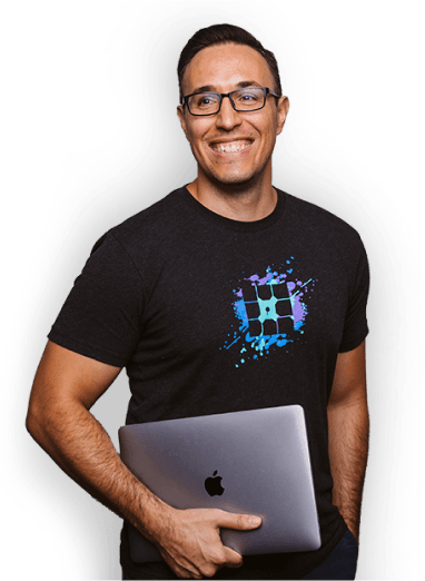 WP Engine team member holding laptop smiling