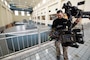 Jib Operator Tyler Spann with Open Jaw Productions prepares to capture video Nov. 2, 2021 of the Center Hill Dam Hydropower Plant for a U.S. Army Corps of Engineers National Inventory of Dams video production. The Nashville District operates and maintains the project on the Caney Fork River in Lancaster, Tennessee. (USACE Photo by Lee Roberts)