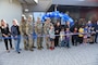 More than a half a dozen Grafenwoehr Elementary students join distinguished guests and leaders from across the military community and Department of Defense Education Activity to cut the ribbon for the new Grafenwoehr Elementary School in Grafenwoehr, Germany Sept. 12, 2023. Officials from the Department of Defense Education Activity, U.S. Army Corps of Engineers, U.S. Army Garrison Bavaria, 7th Army Training Command and more participated in the ceremony for the new school. (U.S. Army photo by Richard Puckett)