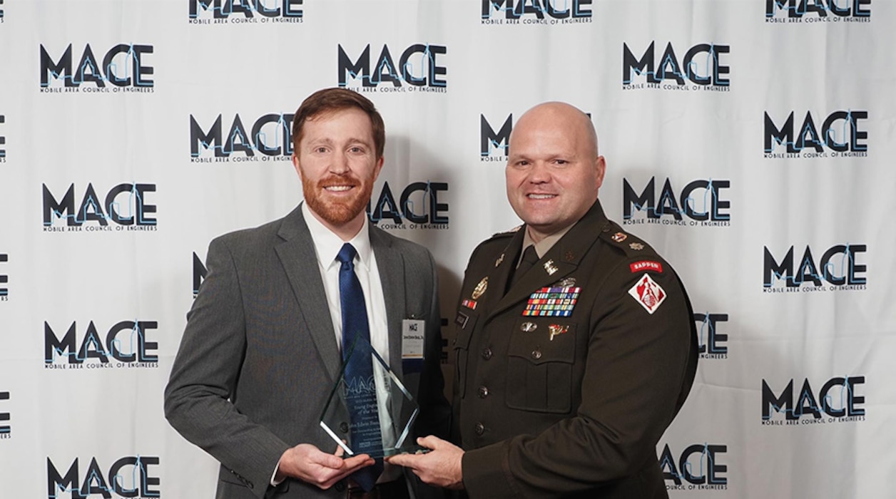 John Bass, Senior Engineering Technical Lead for Civil Works, alongside LTC Gary Cutler, Deputy Commander of Mobile District, captured at the 2024 MACE award ceremony on January 18, 2024, in Mobile, Ala. Bass received 2024 ?Young Engineer of the Year’ award. (Courtesy photo)