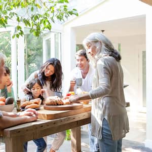 Family having breakfast in the sunroom kitchen