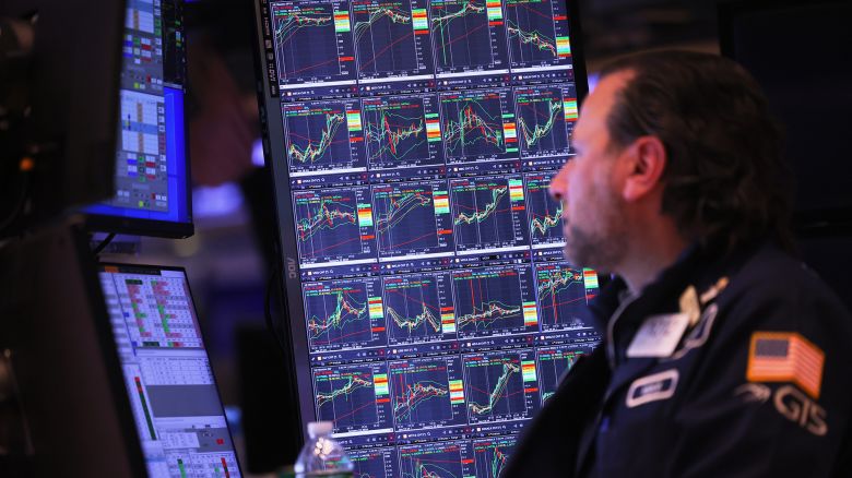 Traders work on the floor of the New York Stock Exchange during afternoon trading on January 22, 2024 in New York City.