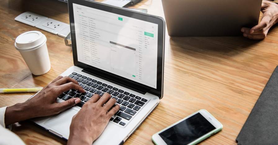 someone checking their email on a computer