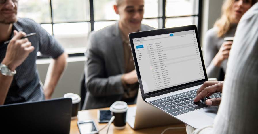 checking email in an office