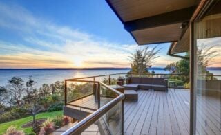 A wooden deck with lake views