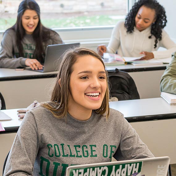 students sitting at their desk listening to lecture