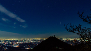 Geminid meteor moving across the sky during the Gemind Meteor Shower in December at Mt.Tsukuba, Ibaragi Prefecture, Japan.