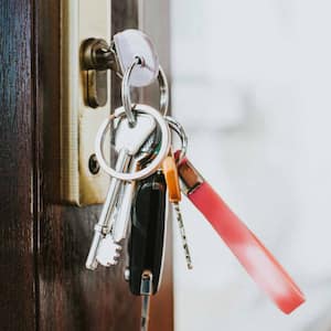 Bunch of keys hanging in a door