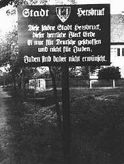 A sign outside a town in northern Bavaria warns: "City of Hersbruck. This lovely city of Hersbruck, this glorious spot of earth, was created only for Germans and not for Jews. Jews are therefore not welcome." Hersbruck, Germany, May 4, 1935.