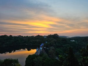 A dam and its reservoir during sunset. Peechi, Thrisur, Kerala. 