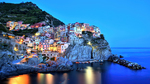 The village of Mararola, Italy, during the blue hour.