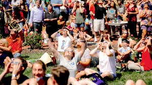 A crowd in Chapel Hill, North Carolina, watch the 2017 Great American Eclipse.