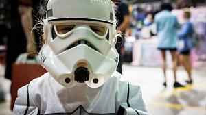 Young girl dressed in a stromtrooper costume from Star Wars