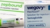 FILE - A combination image shows an injection pen of Zepbound, Eli Lilly's weight loss drug, and boxes of Wegovy, made by Novo Nordisk