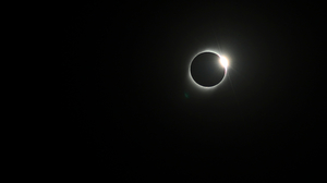 The diamond ring effect, as seen from San José de Jáchal, Argentina, July 2019.