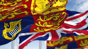 Colorful flags flying, the Royal Standard and the Union Jack