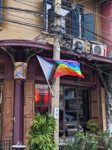  Progress Pride Flag on an electric pole. 