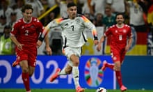 FBL-EURO-2024-MATCH37-GER-DEN<br>Germany's forward #07 Kai Havertz (C) runs with the ball past Denmark's defender #02 Joachim Andersen during the UEFA Euro 2024 round of 16 football match between Germany and Denmark at the BVB Stadion Dortmund in Dortmund on June 29, 2024. (Photo by Tobias SCHWARZ / AFP) (Photo by TOBIAS SCHWARZ/AFP via Getty Images)